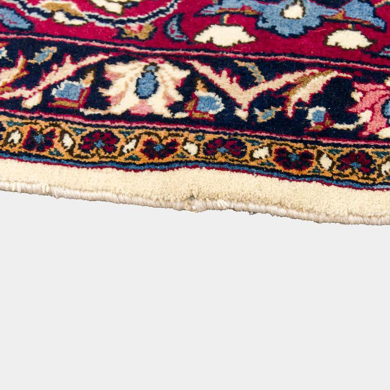 A Meshed rug, old, 380 x 300 cm.