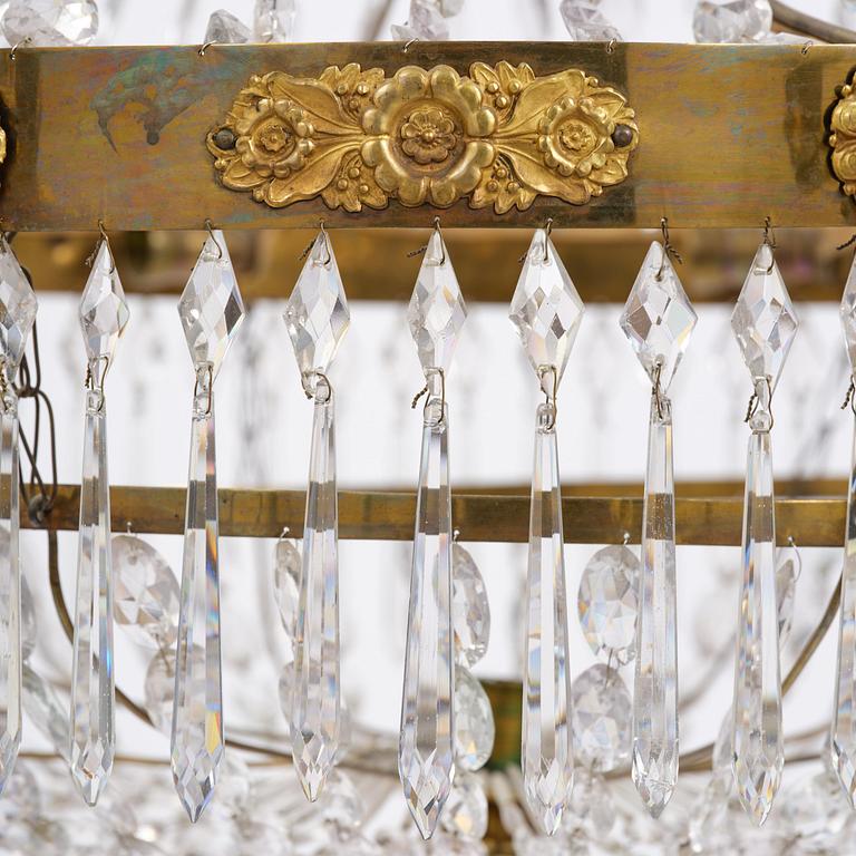 A Swedish late Empire gilt brass nine-light chandelier, 1830's.