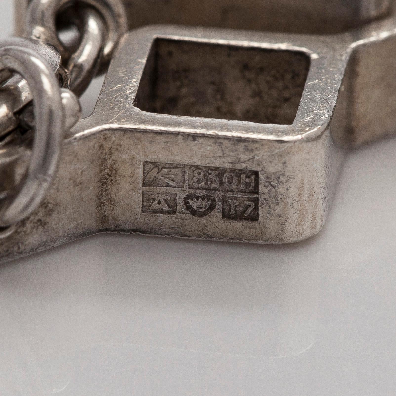 Jorma Laine, a set of two silver pendants, a bracelet and a brooch. Kultateollisuus Oy, Turku 1965-1972.