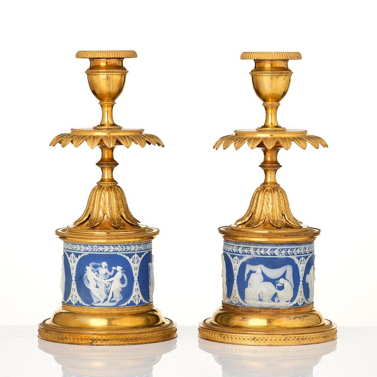 A pair of George III ormolu and jasperware candlesticks, late 18th century.