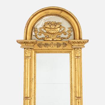 A lat Gustavian mirror from around  the year 1800.