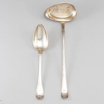 A Swedish 19th century silver soup ladle and serving spoon, Stockholm 1827 and 1837.