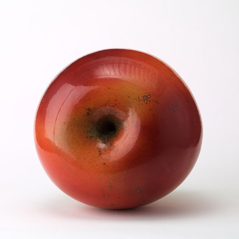 A Hans Hedberg faience sculpture of an apple, Biot France.