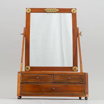 An Empire table mirror, first half of the 19th century.