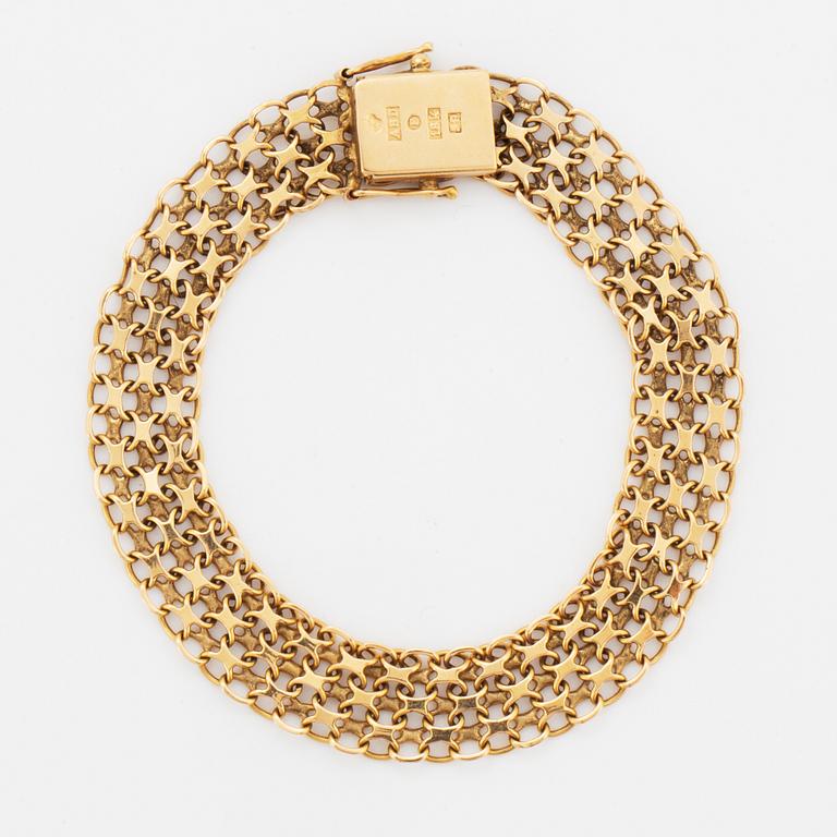 18K gold bracelet.