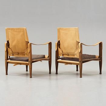 a pair of 'Safari' oak and leather armchairs, Rud. Rasmussen, Denmark, probably 1950's.