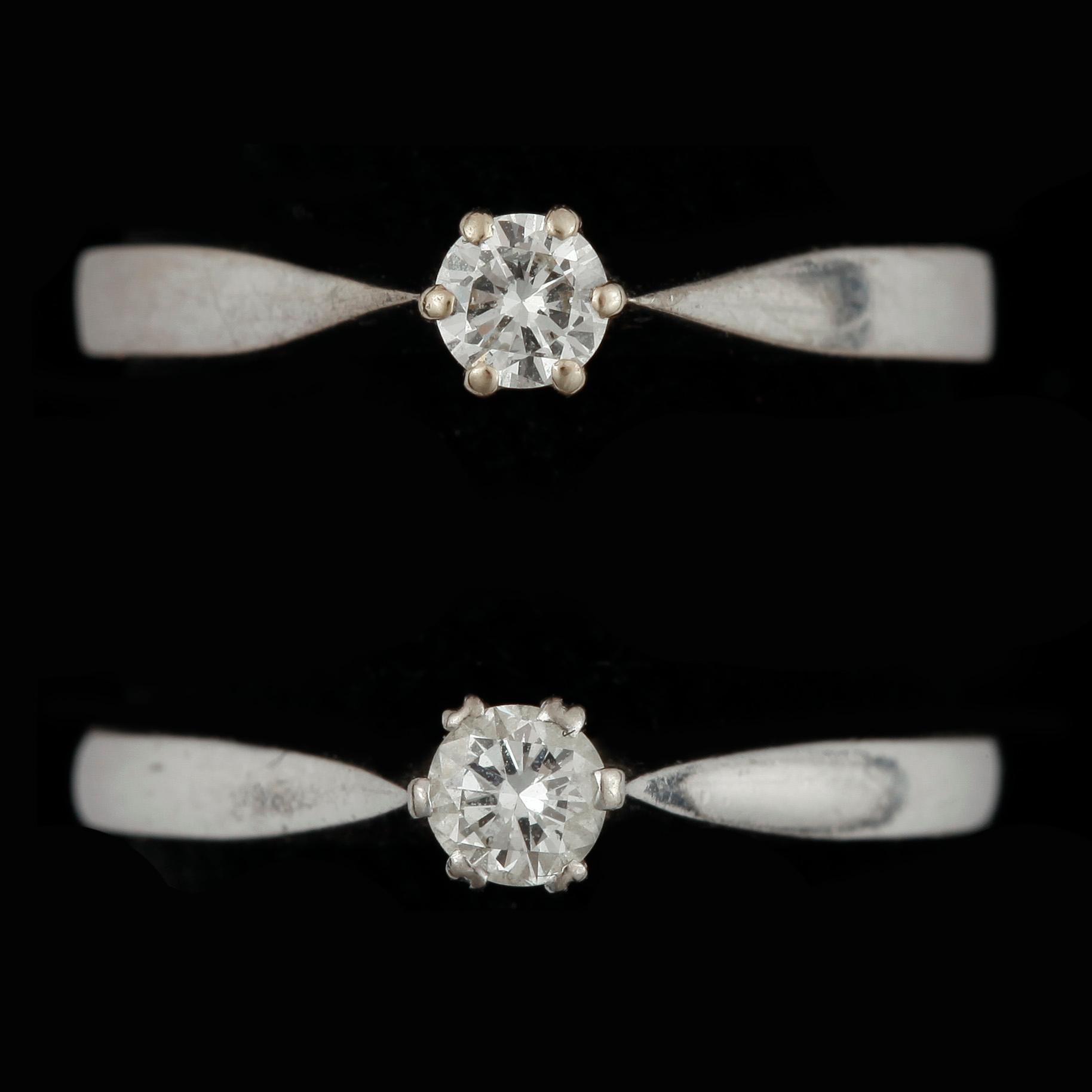 RINGAR, 2 st, vitguld 18 k, diamant 0,17 respektive 0,19 ct. Vikt ca 5,2 g.