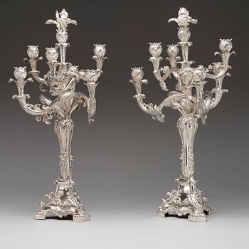 A pair of Swedish 19th century silver candelabras, marks of Gustaf Möllenborg, Stockholm 1845 and 1893.