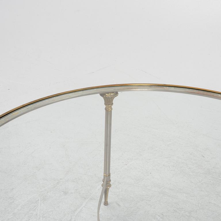 A steel and glass coffee table, Nordiska Kompaniet, end of the 20th Century.