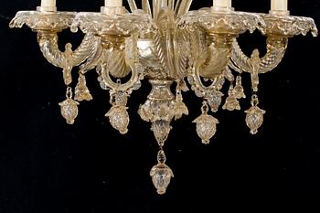 A 20th century six light Venetian style glass chandeliere.