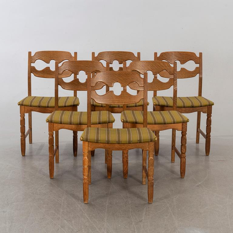 A set of six Danish Henning Kjaerulf chairs, second half of 20th century.