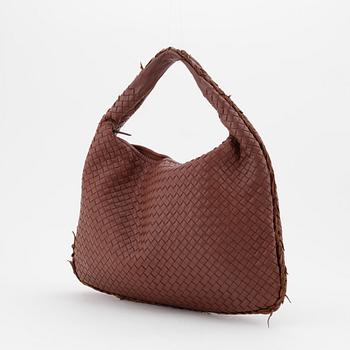 Bottega Veneta, an intrecciato leather hobo bag.