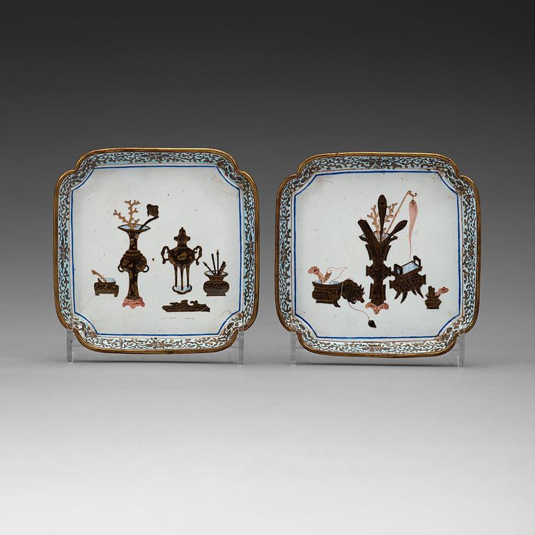 A pair of enamel on copper coasters, Qing dynasty, 18th Century.