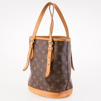 LOUIS VUITTON MONOGRAM PETIT BUCKET BAG WITH A POCHETTE.