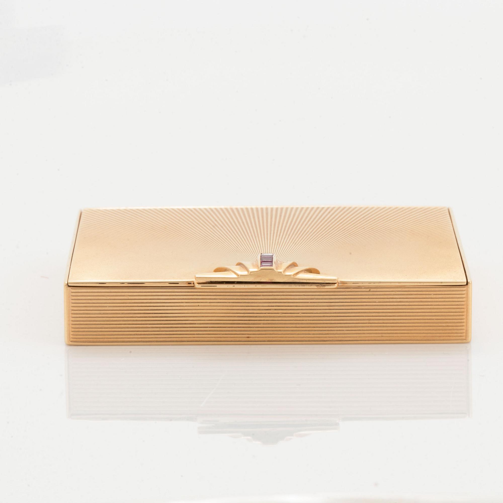 14K gold and ruby vanity case.