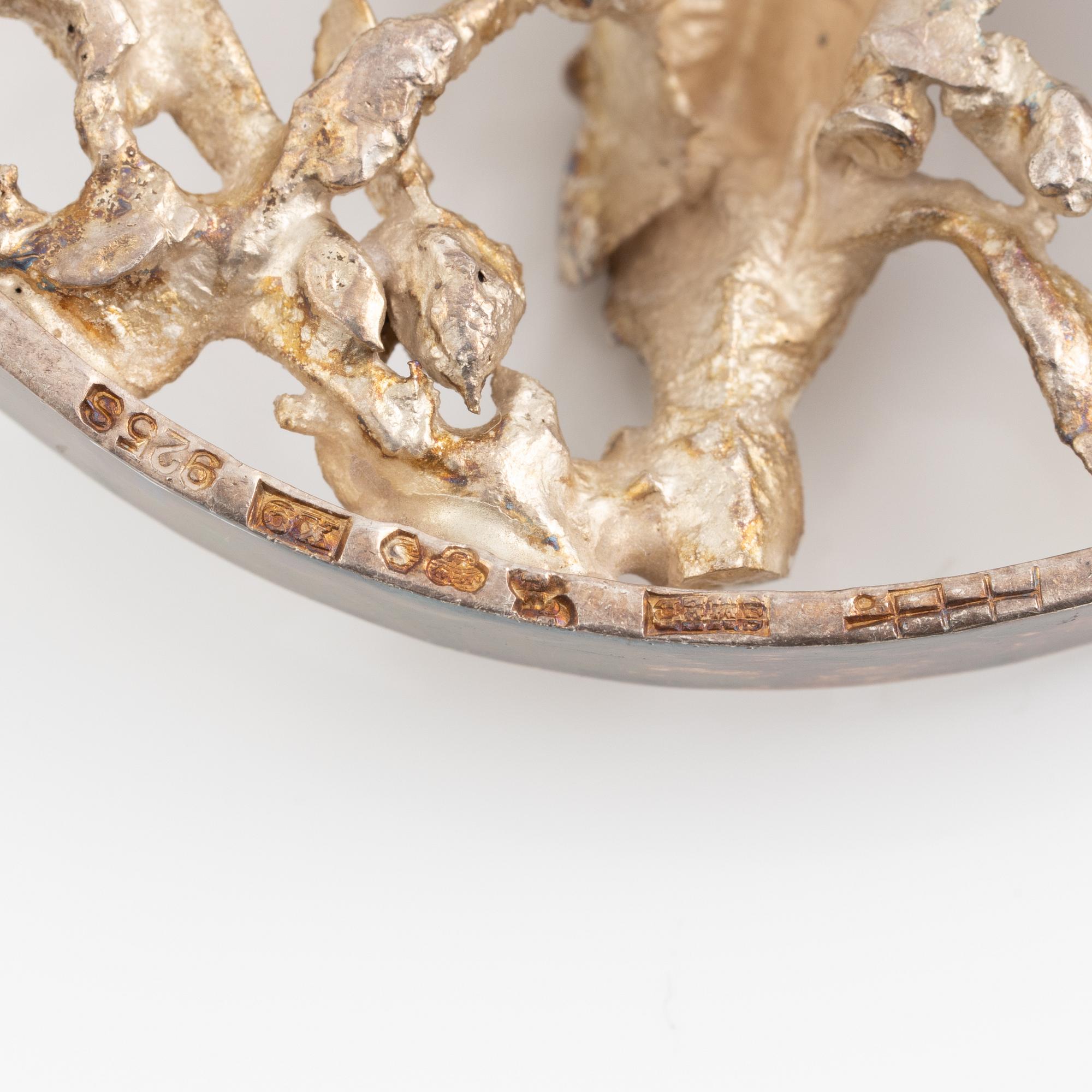 Lars Arby, four pendants with a chain and a neck ring, silver, Gothenburg 1965, 1969, 1976 and 1982.