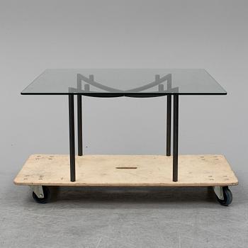 GEORG TOTH, an iron and glass coffee table, signed G. Toth and dated 1998.