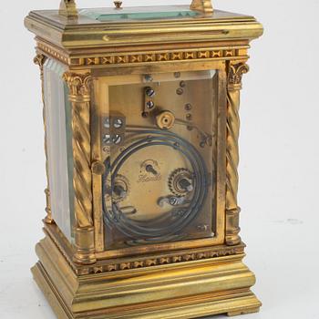 A brass carriage clock, first half of the 20th century.