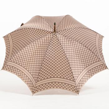 CÉLINE, a beige monogram umbrella.