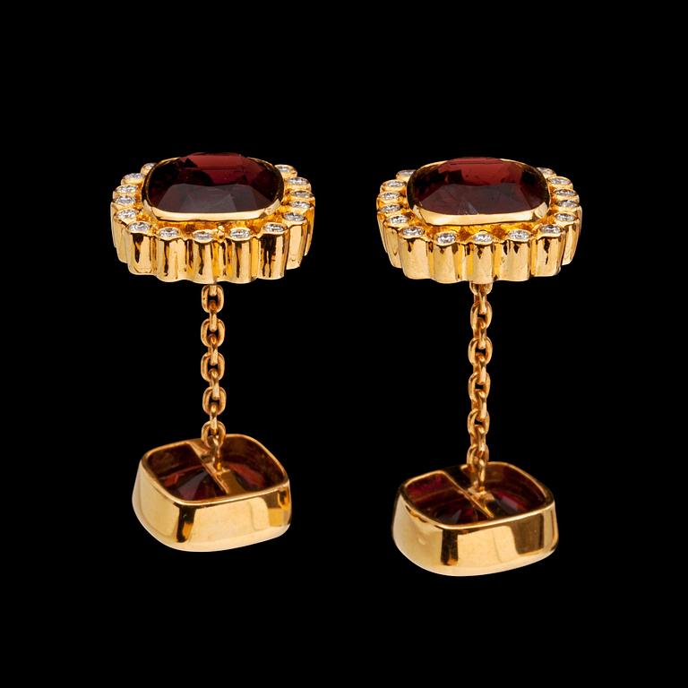 A pair of spinel and diamond cufflinks.