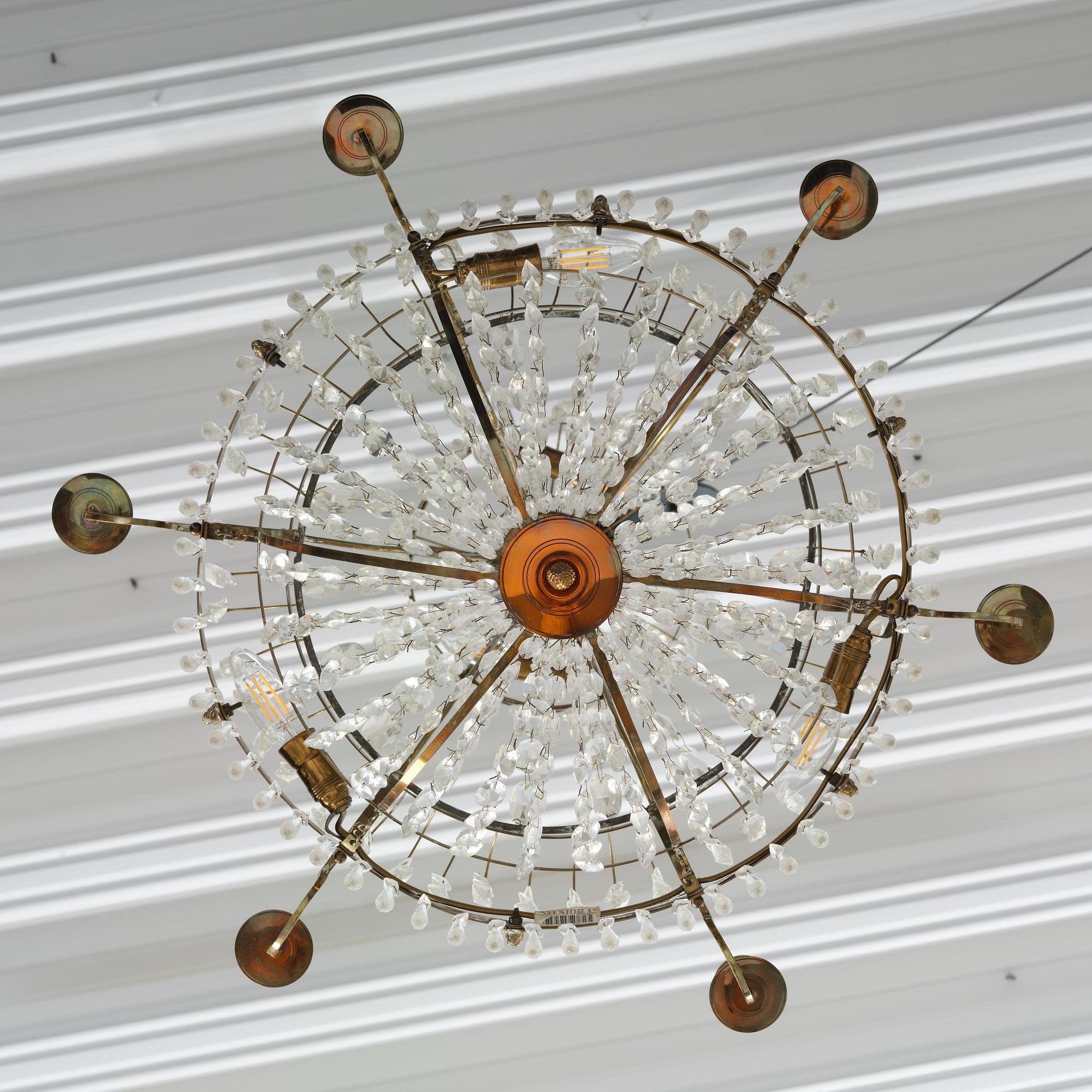 A late Gustavian gilt brass and cut glass seven-light chandelier, circa 1800.