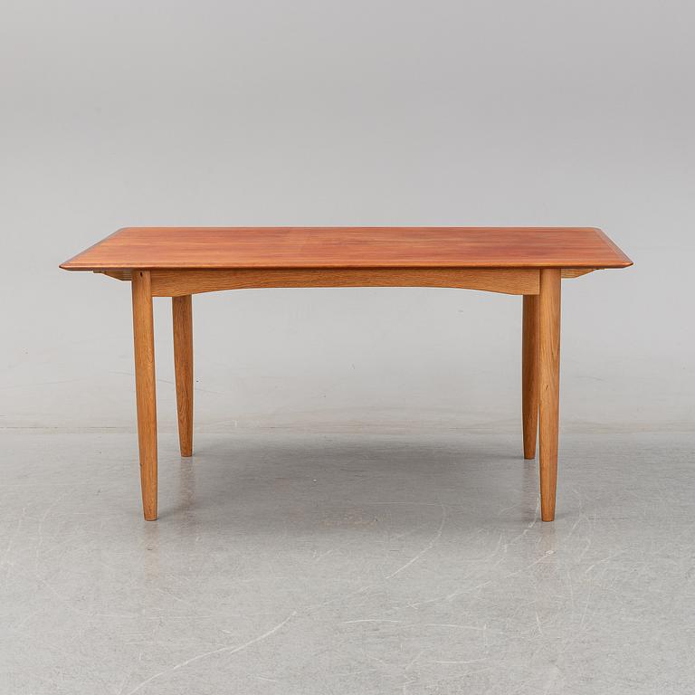 A 1950/60's dining table from Slagelse Møbelvaerk A/S with two additional leaves.