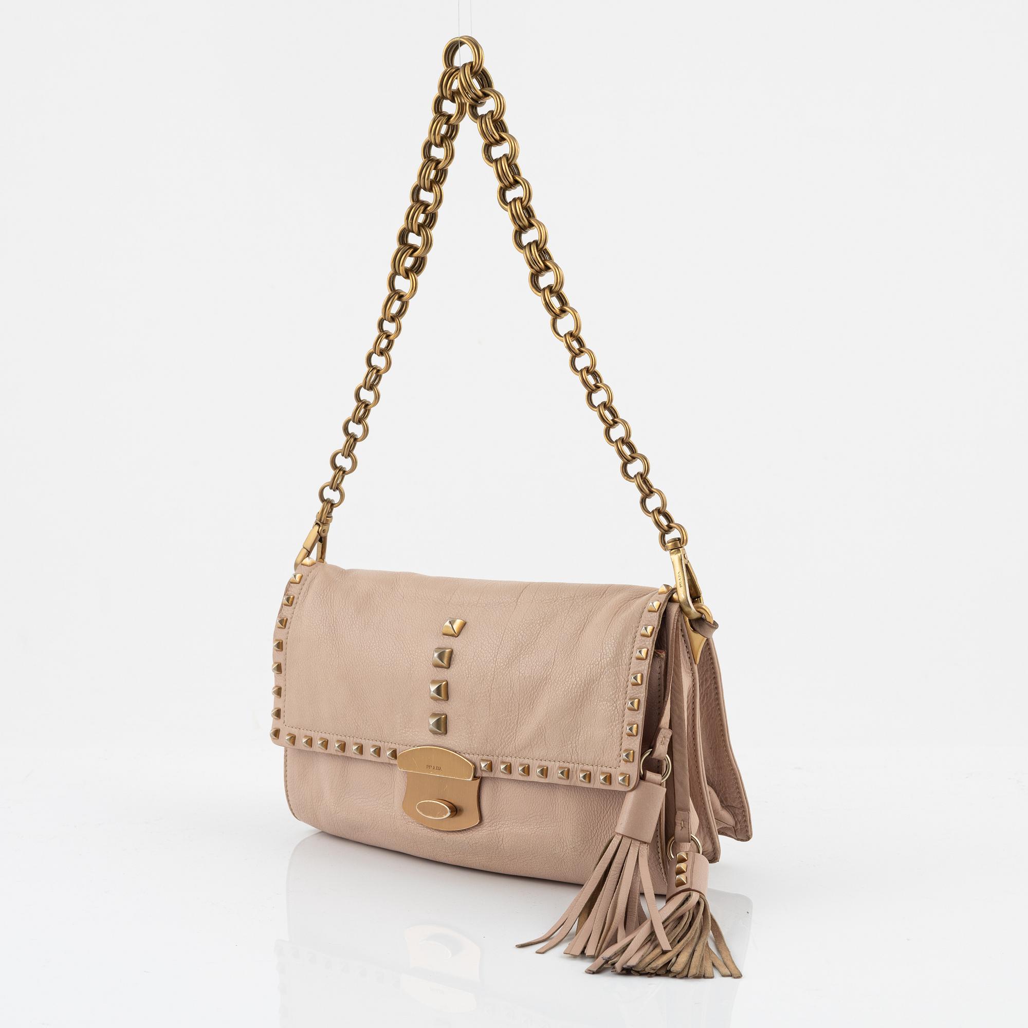Prada, a pink leather and tassle bag.