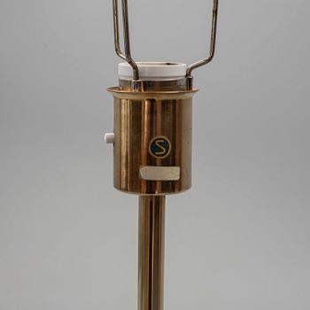 A brass floor light from Nordiska Kompaniet, mid 20th Century.