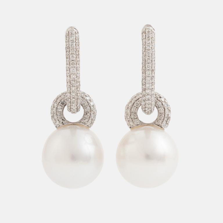 Pearl and brilliant cut diamond earrings.