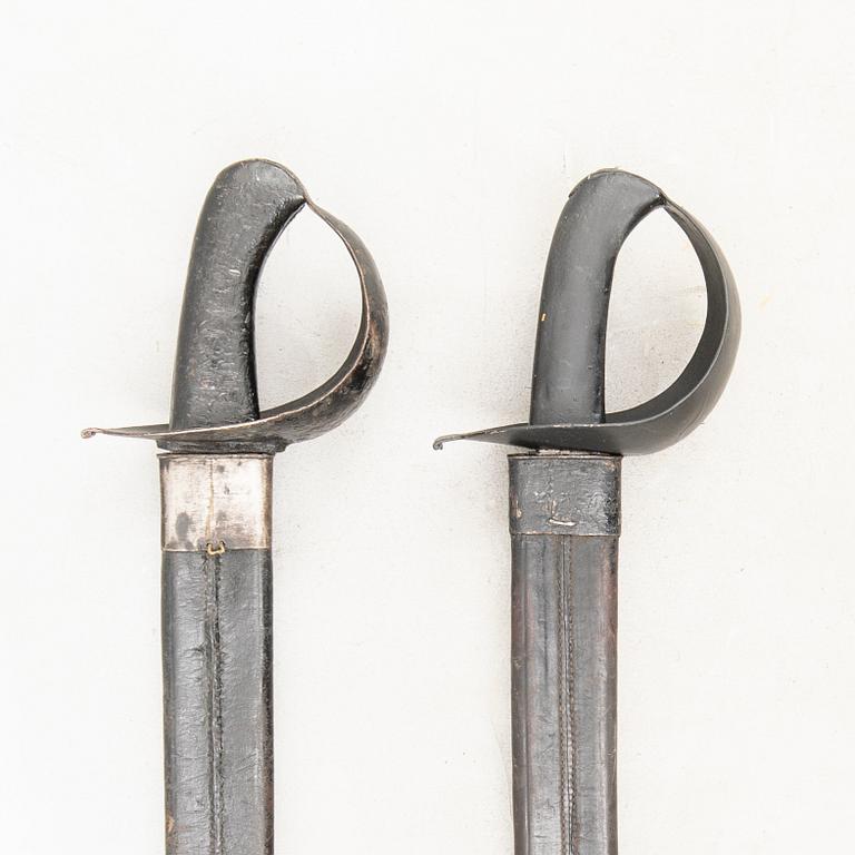 Two Swedish cutlasses 1851 navy pattern.