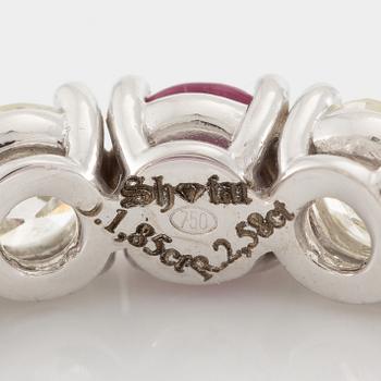 Ring, full eternity band, 18K white gold set with rubies and brilliant-cut diamonds.