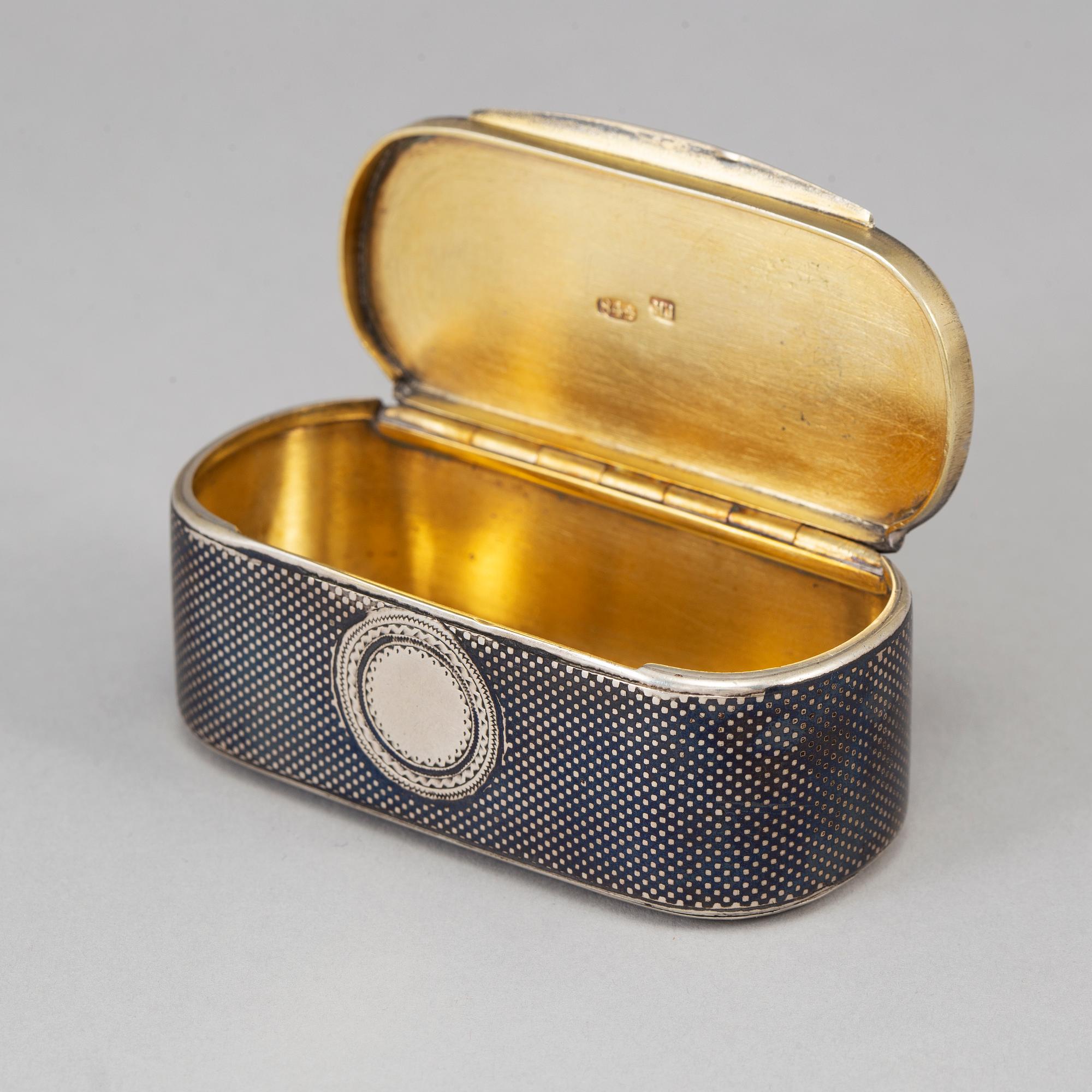 A Russian parcel-gilt silver and niello box, mark of Gustav Klingert, Moskva 1876.