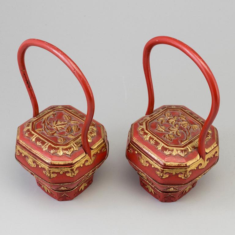 A pair of Chinese red lacquered baskets, early 20th Century.