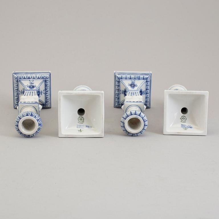 Two pairs of porcelain candlesticks by Royal Copenhagen, Denmark, third quarter of the 20th century.