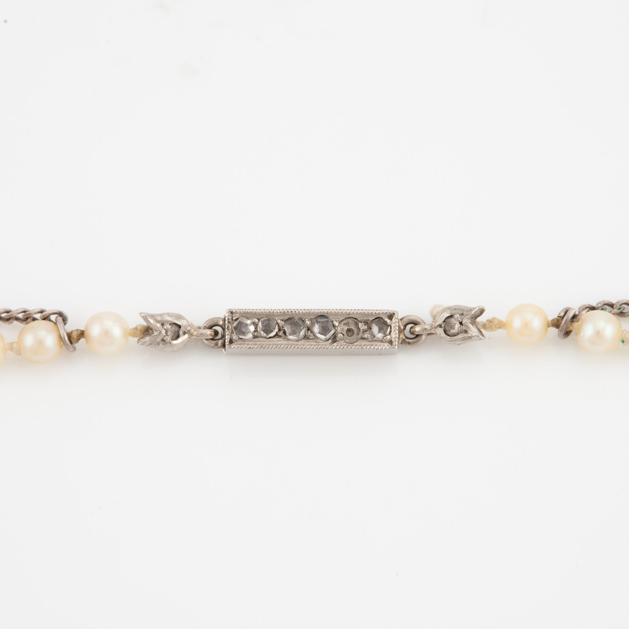 Necklace with cultured graduated pearls, white gold clasp with rose-cut diamonds.