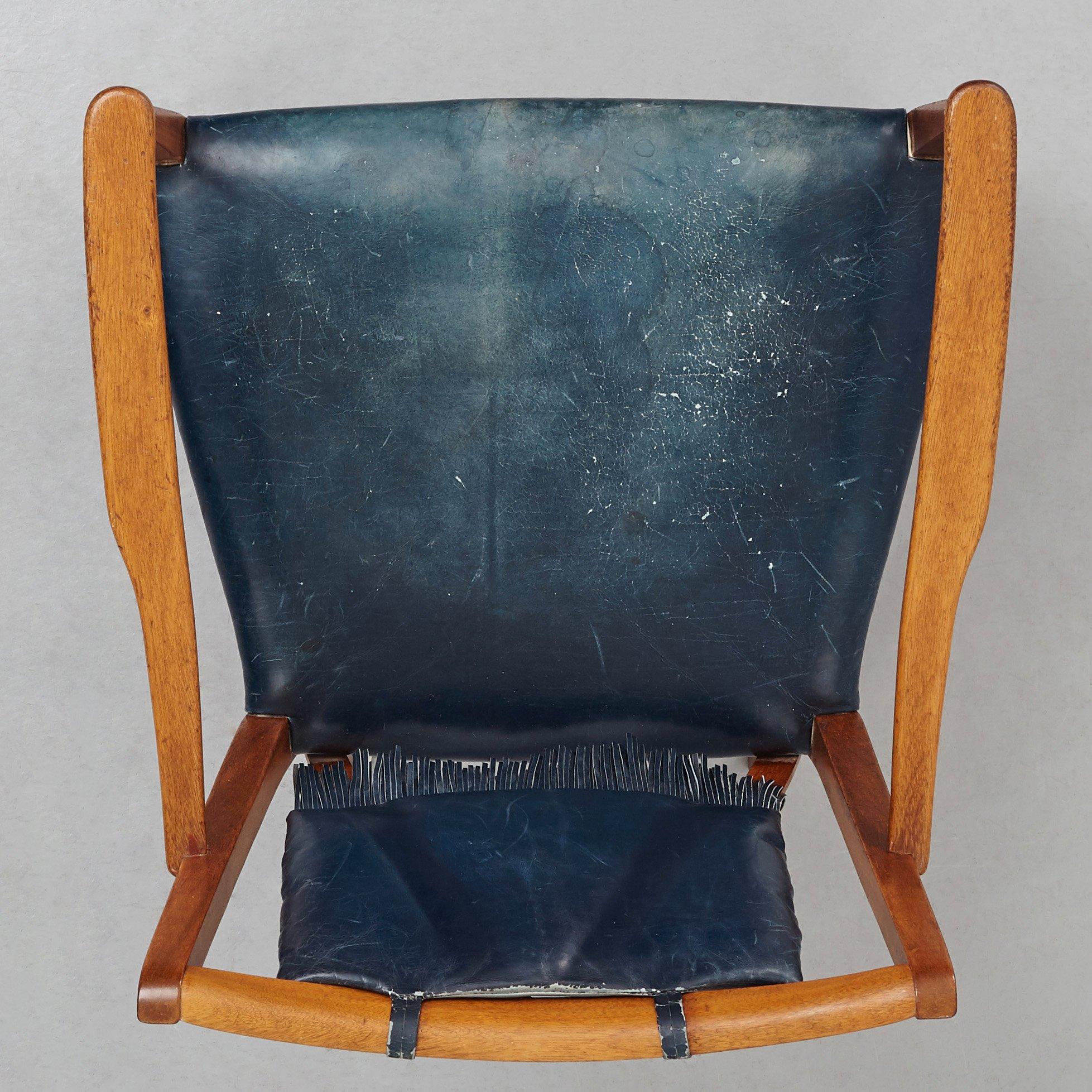Josef Frank, a mahogany and blue leather chair for Firma Svenskt Tenn, Sweden probably 1950-60's.