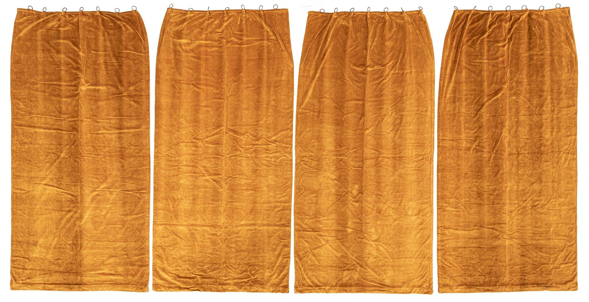 A set of four yellow velvet curtains, 1910's/20's, ca 247 x 120 cm.