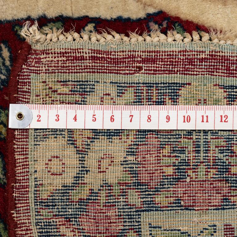 An antique Kirman Laver figural, Southeastern Iran, c. 220 x 135 cm.