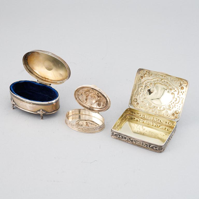 7 silver boxes.
