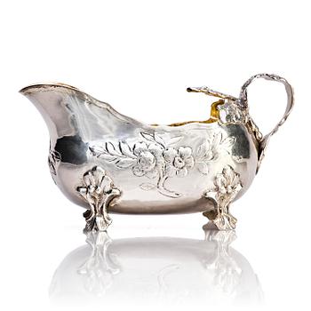 256. A Swedish mid- 18th century parcel-gilt silver cream-jug, mark of Anders Schotte, Uddevalla 1776.