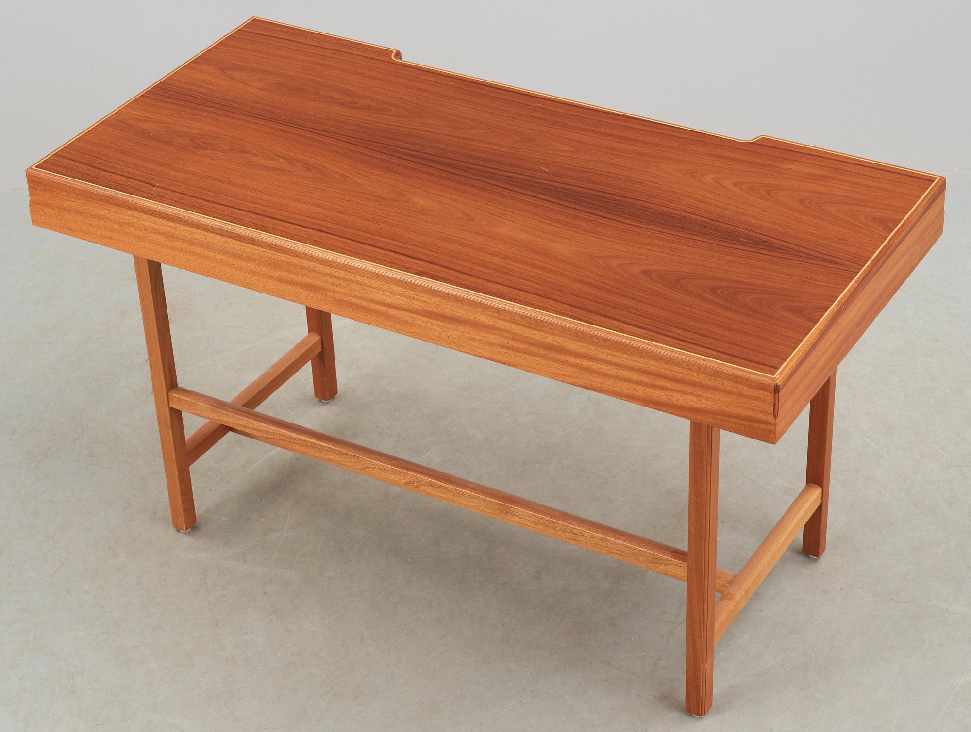 A Josef Frank mahogany desk, Firma Svenskt Tenn, model 1022.