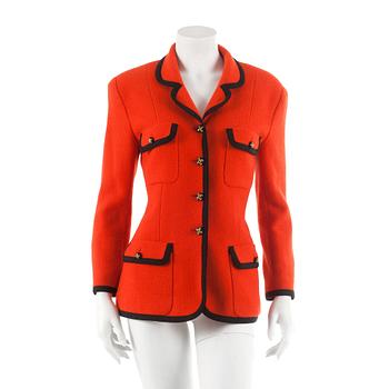 681. CHANEL, a orange wool jacket. French size 42.