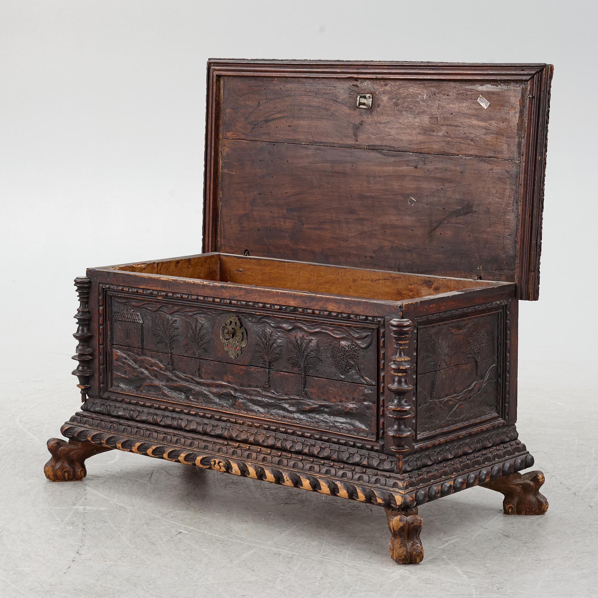 A baroque style wooden chest, 19th century.