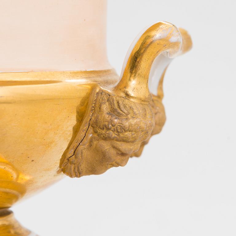 A pair of German porcelain urns from around the mid-19th century.