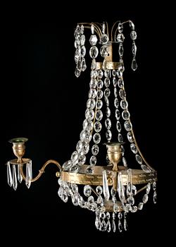 VÄGGLYSTRAR, ett par, 1900-talets första hälft.