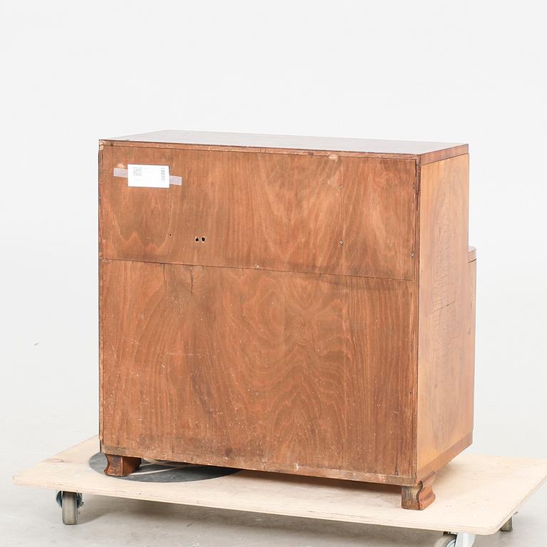 An Art Deco walnut cabinet/record player first half of the 20th century.