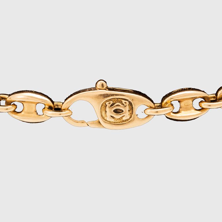 An 18K gold bracelet by Cartier.