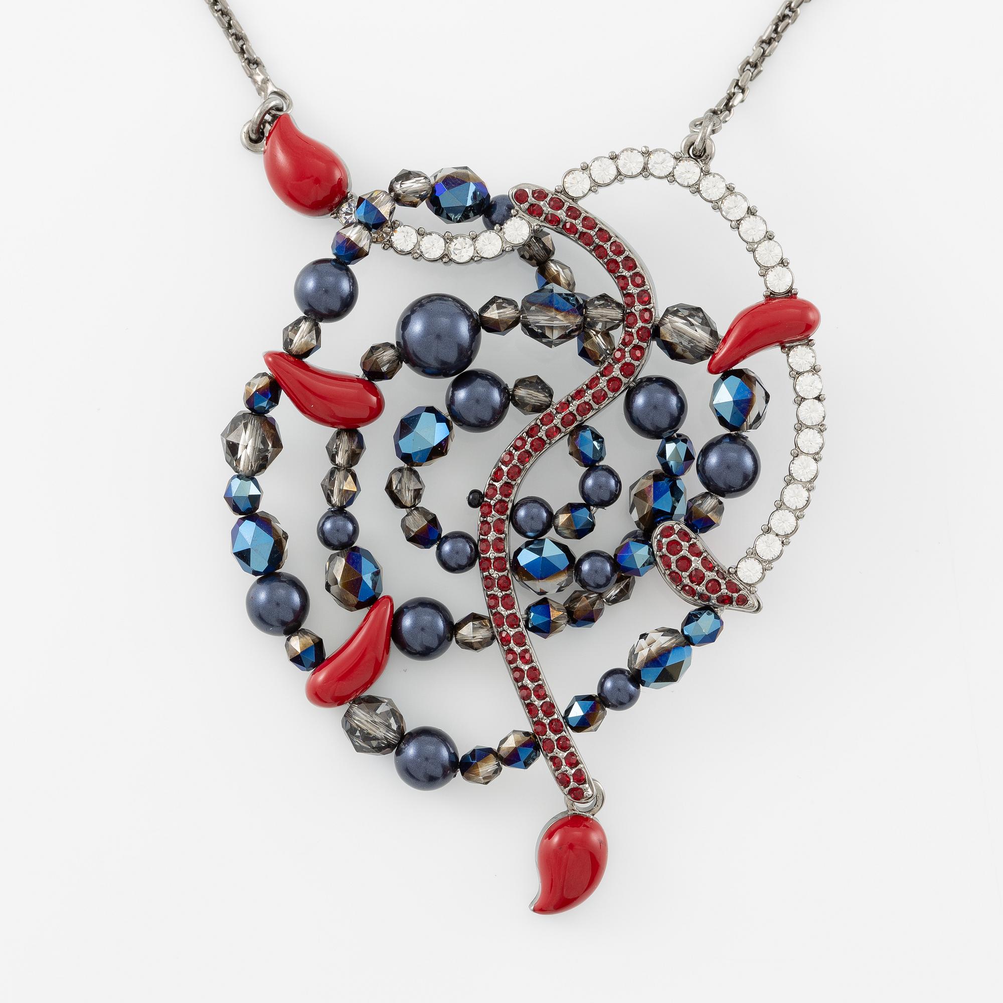 Swarovski, örhängen och halsband.