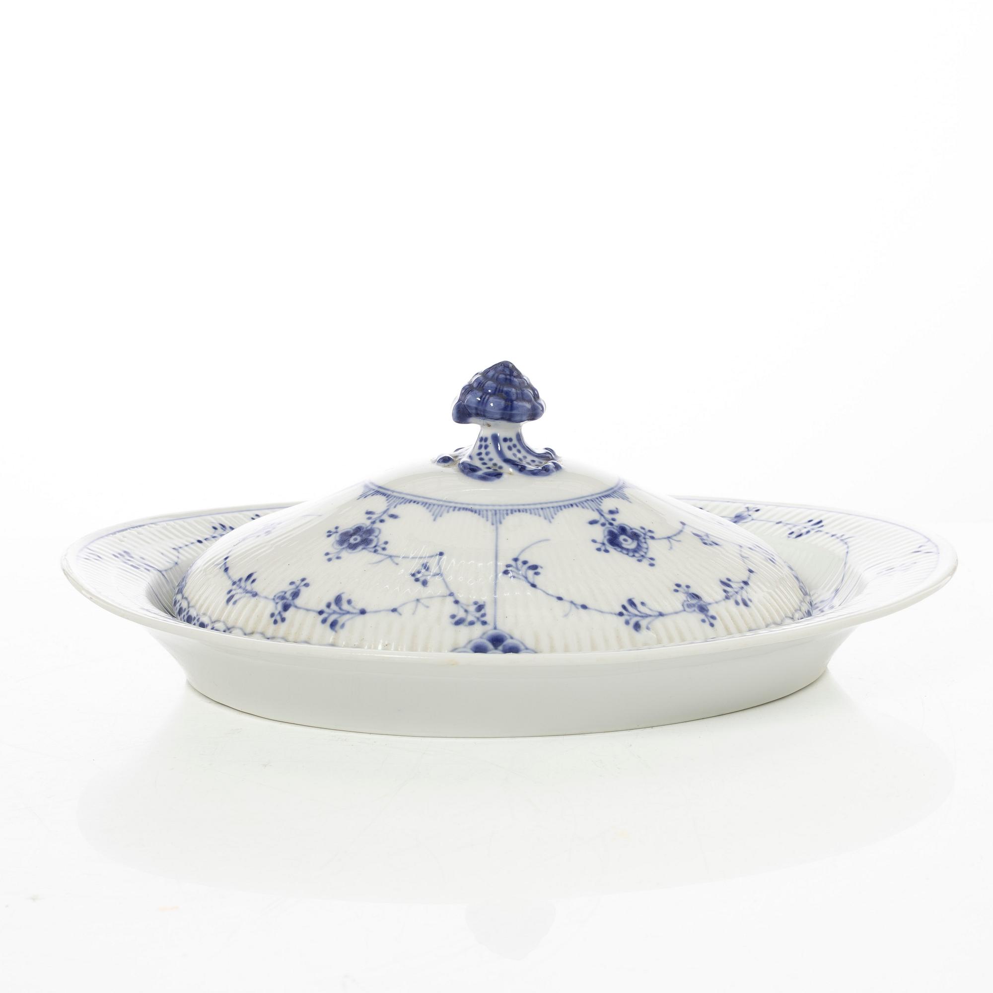 Royal Copenhagen, 35 pieces of a porcelain 'Blue Fluted' half lace dinner service, Denmark, 1889-1978.