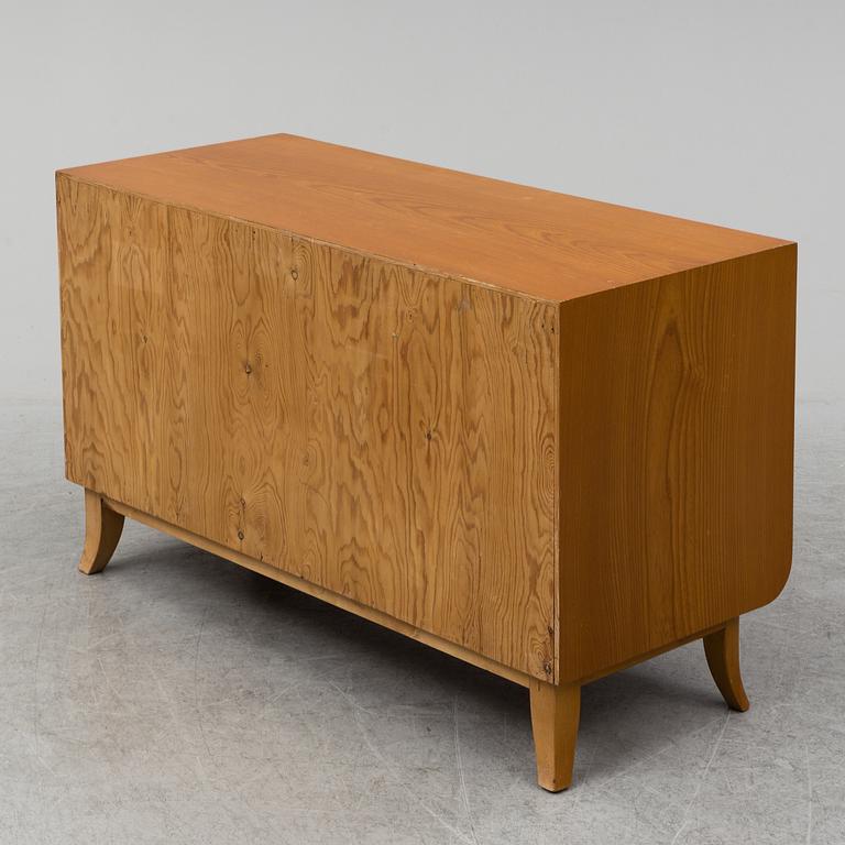 A chest of drawers, mid 20th century.